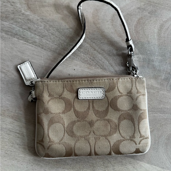 Coach Handbags - Coach Beige and Brown Signature Wristlet Vintage